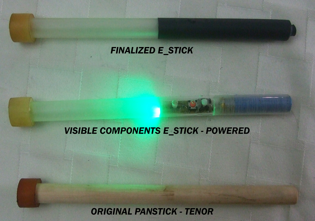 Final electronic panstick, illuminated internal components and a traditional tenor panstick for comparison