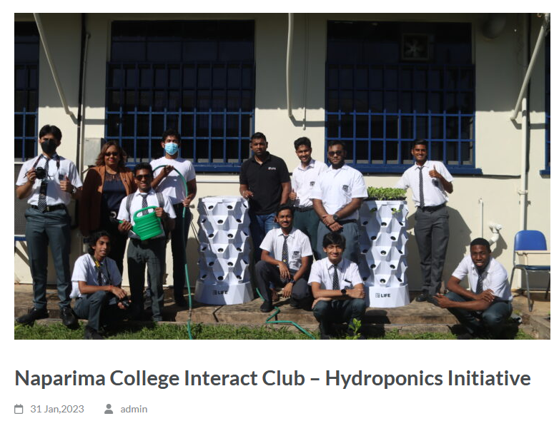 Naparima College students and educators gathered with hydroponic tower systems